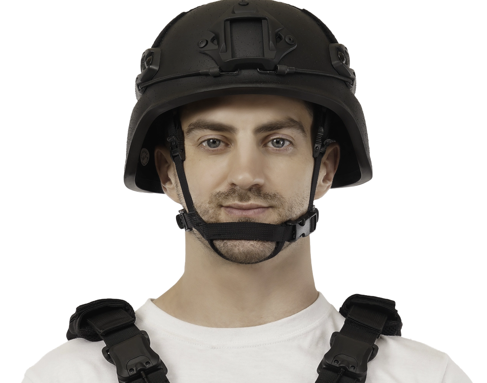 Front view of a person wearing a tactical helmet fitted with a black NVG shroud mount and chin strap.