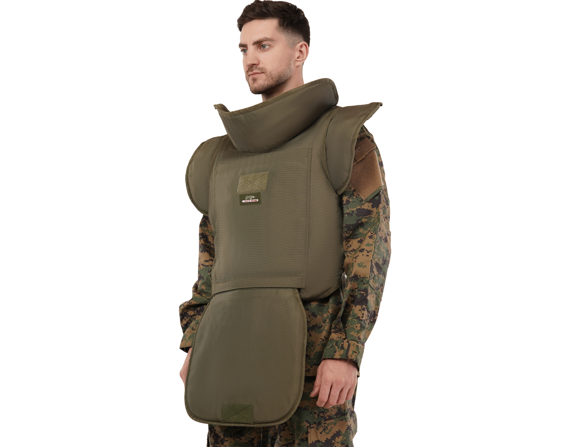 Man wearing Hard Shell olive green demining suit with high neck and extended groin protection for blast safety.