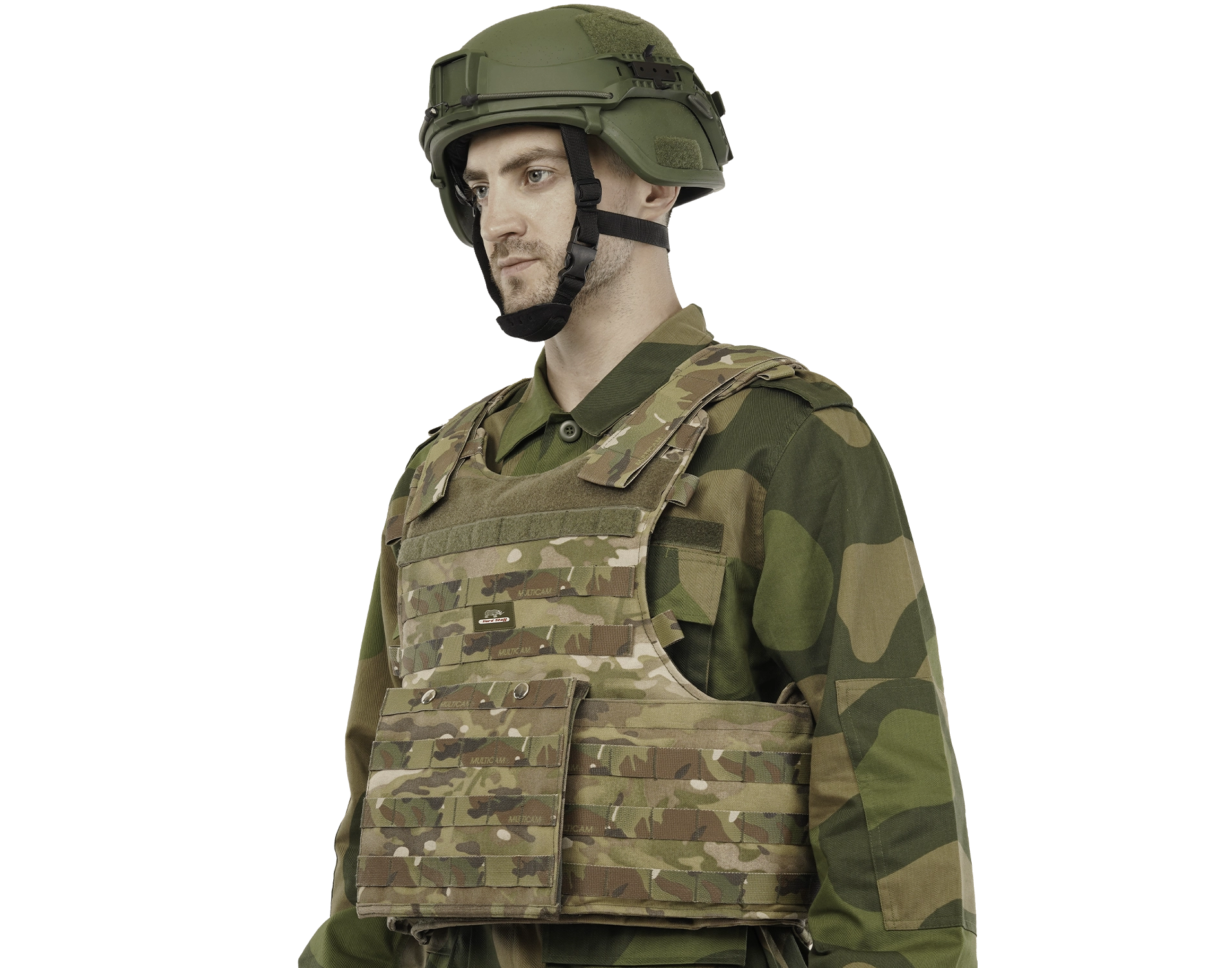 Man wearing Hard Shell camouflage Tactical Operator Vest and ballistic helmet for military protection and performance.