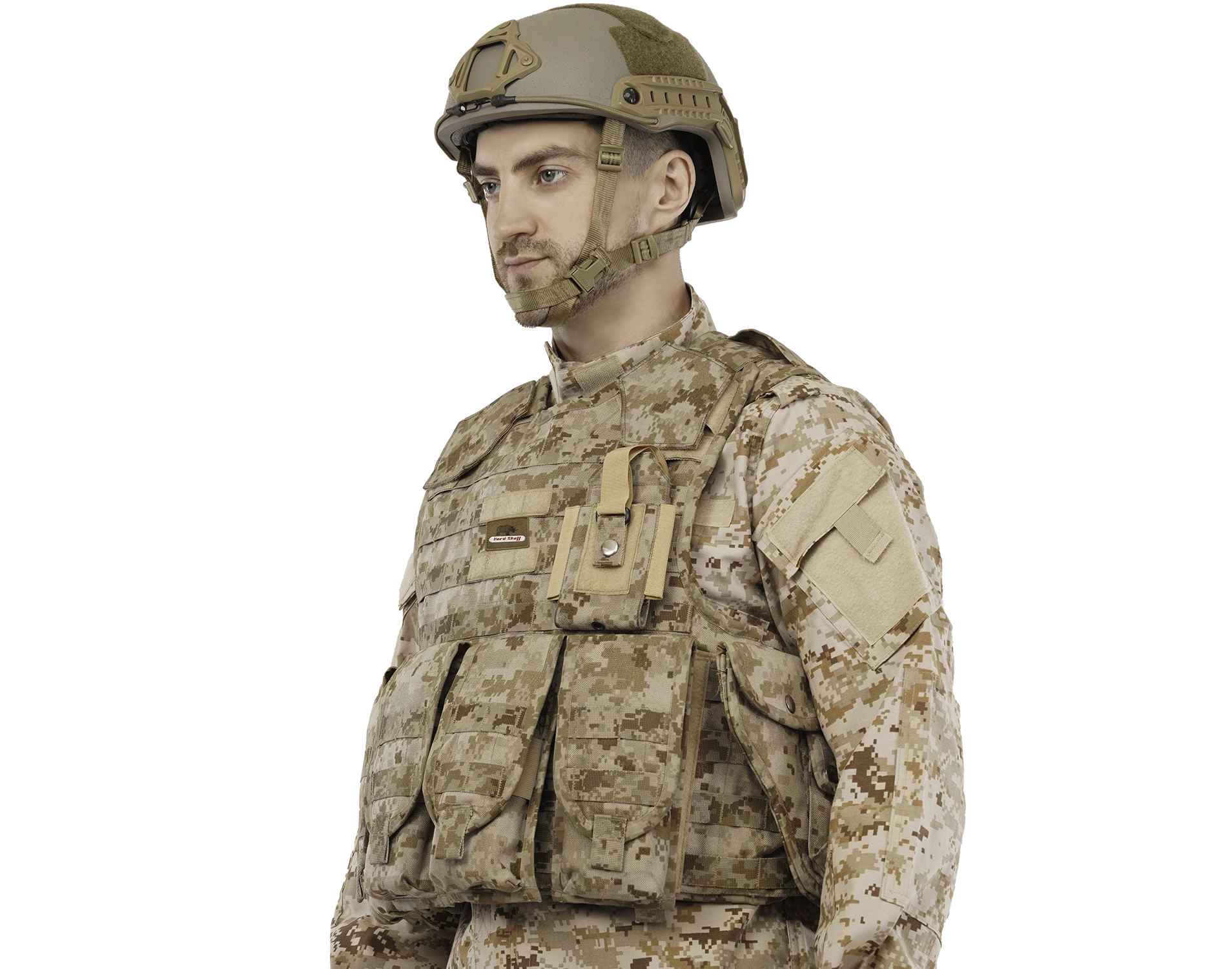 Man wearing Hard Shell PullTac Quick Release Vest in desert camo with tactical helmet and pouches.