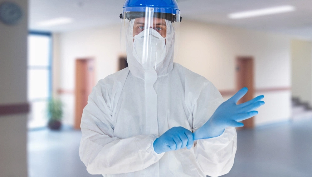 ppe-kit-protection-medical-safety-suit-gloves-mask.webp.webp